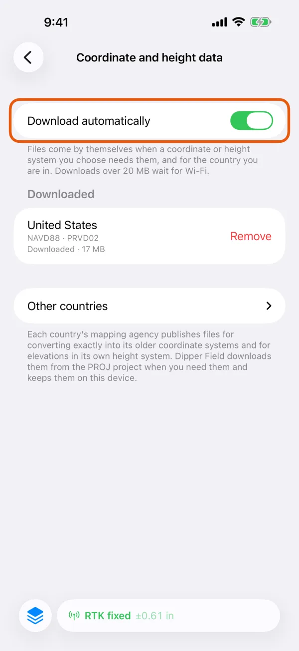 The Download automatically switch, with the downloaded sets below it.